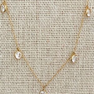 Yellow gold station necklace